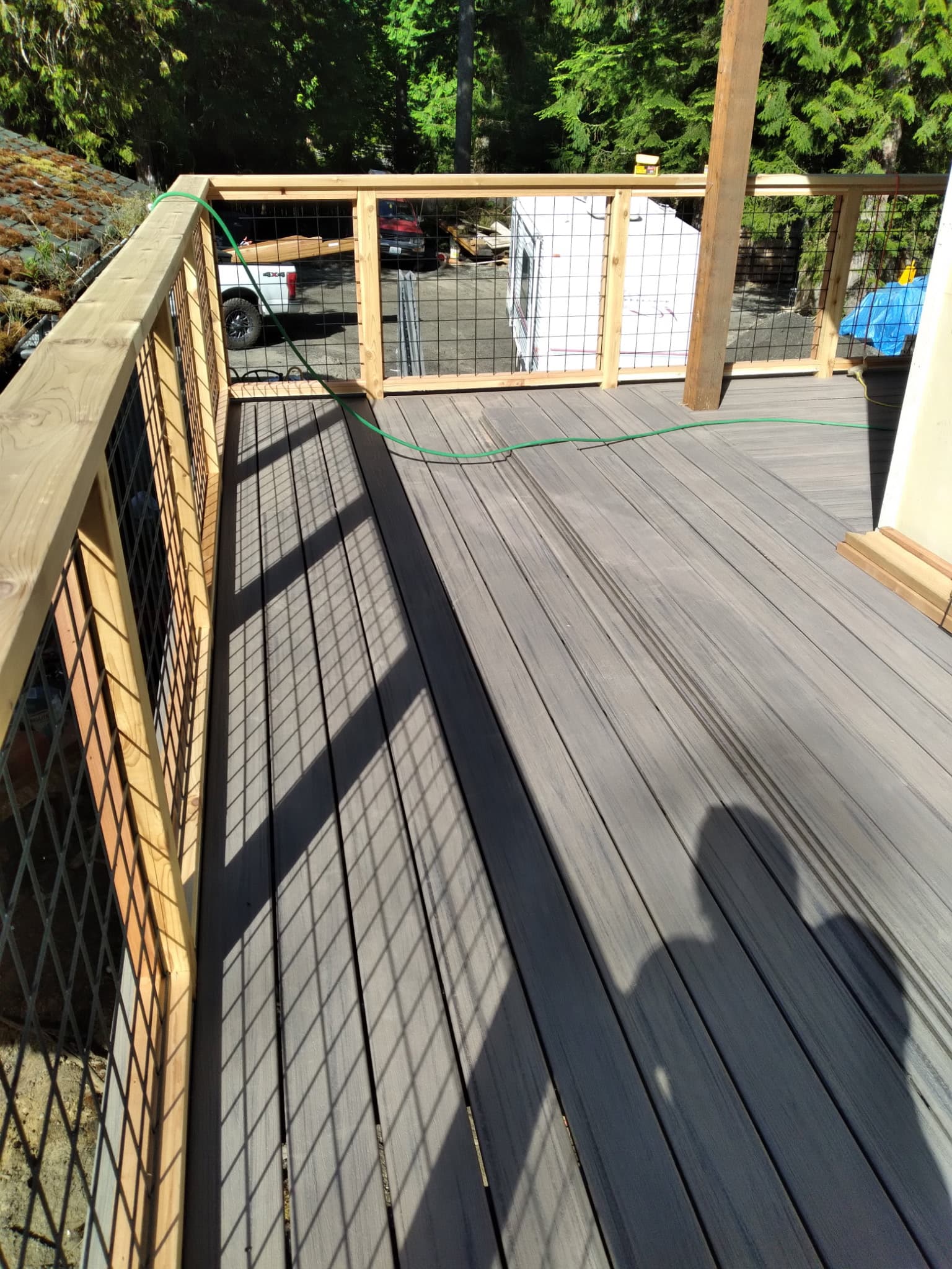 Overhead view of composite deck with wire mesh railing