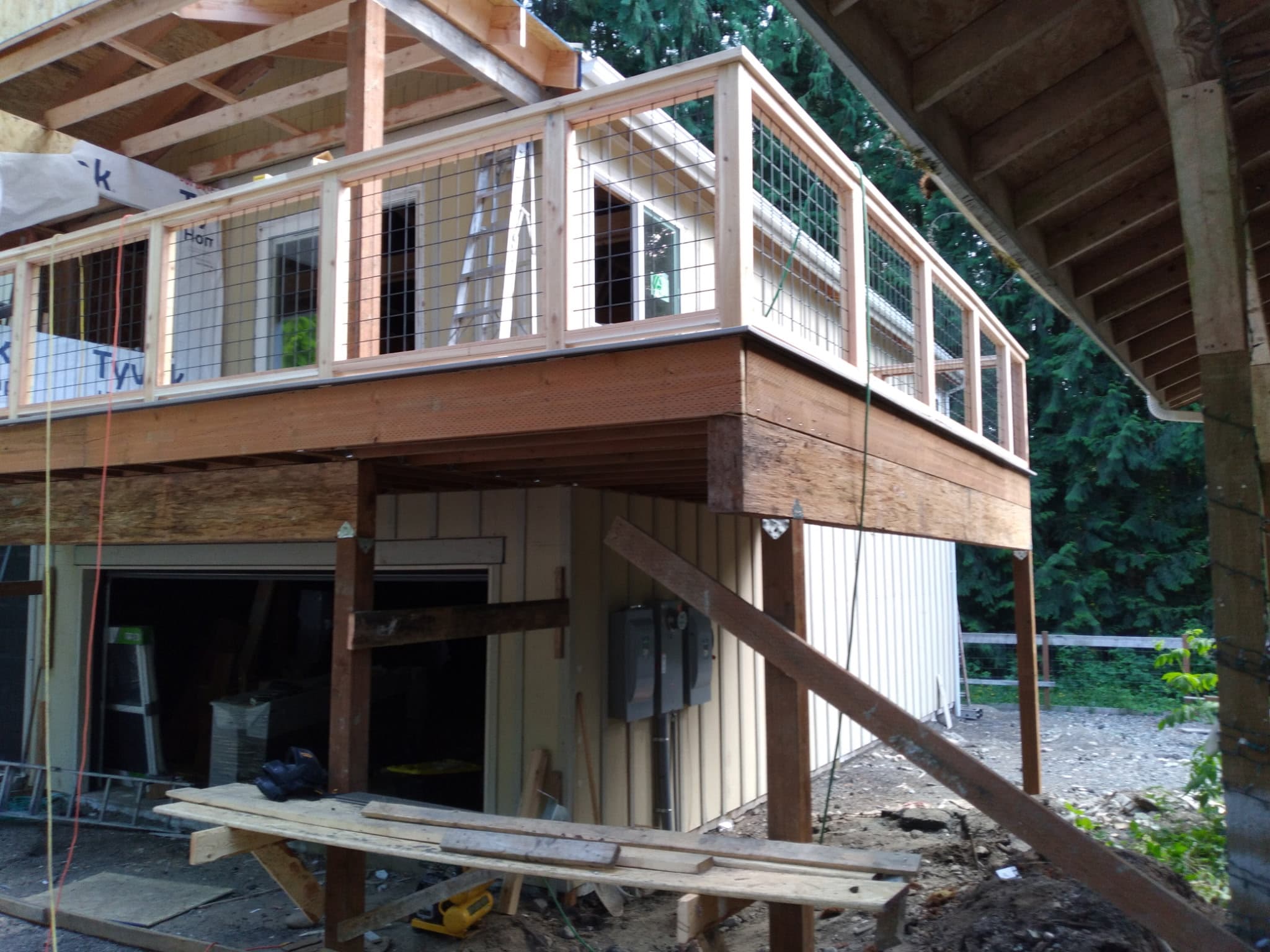 Second-story deck framing under construction on residential home